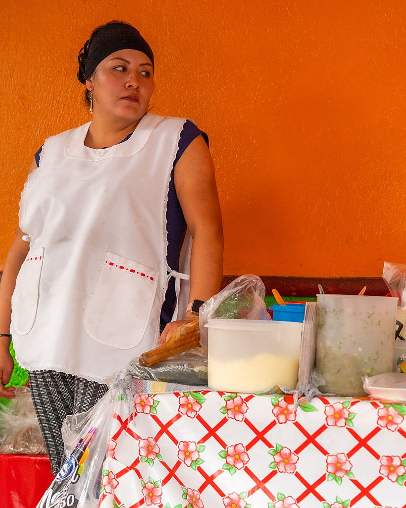 A market trader at her food stall